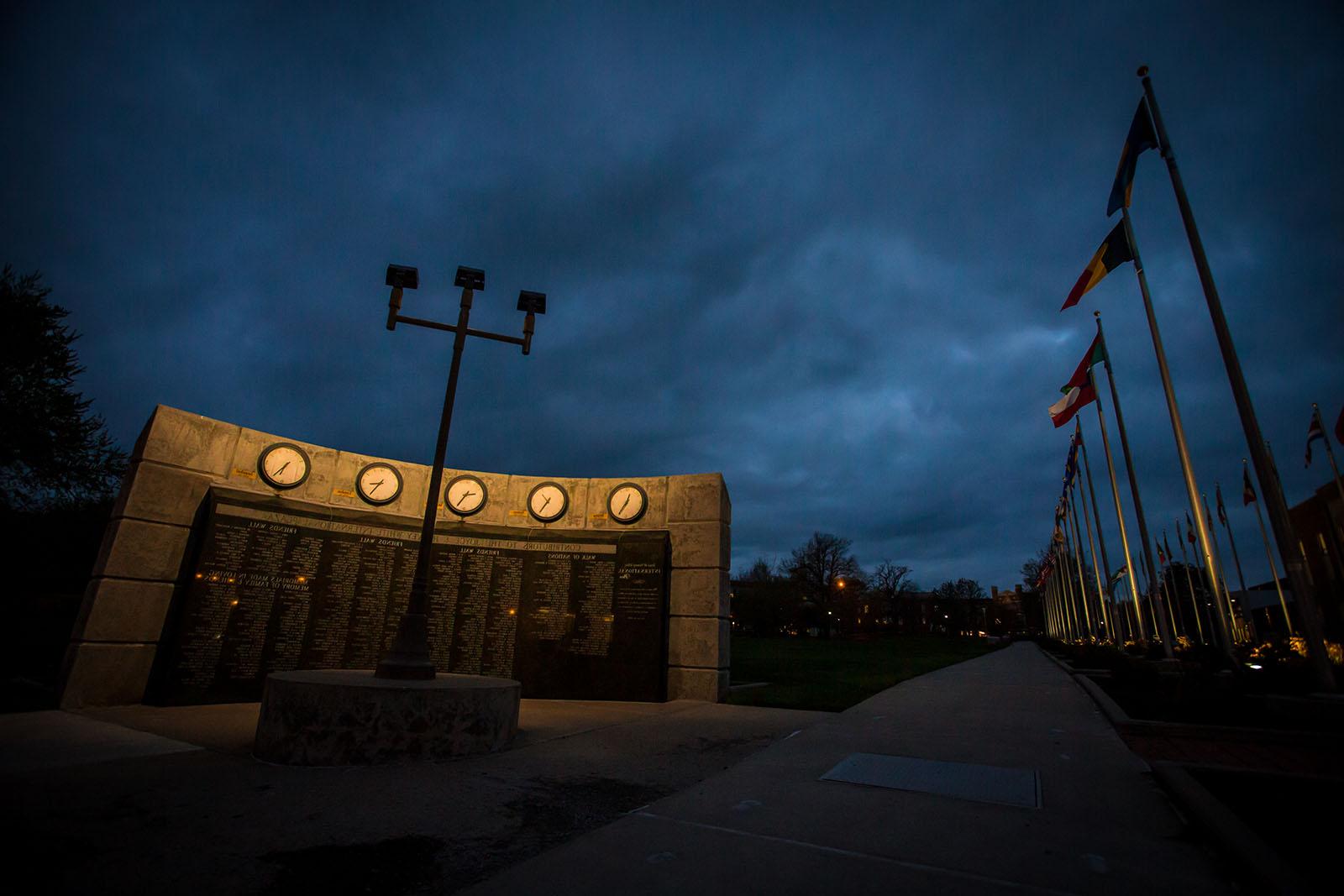 The “Friends Wall & World Clock” stands at the southern end of the Joyce and Harvey White International Plaza. The granite wall displays the names of alumni and friends who helped fund and support the International Plaza project.